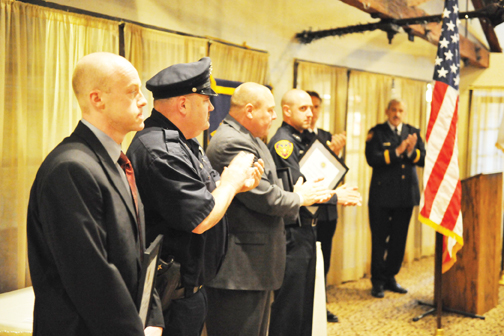 Aurora officers Darrell Moore and John Munn were awarded Officer of the Year